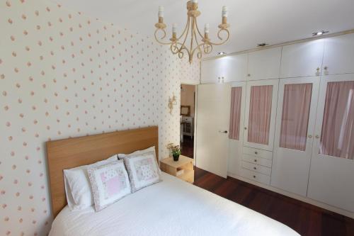 Postel nebo postele na pokoji v ubytování Mallona Apartamento Turístico