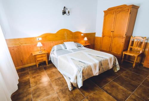 Ένα ή περισσότερα κρεβάτια σε δωμάτιο στο El Rancho