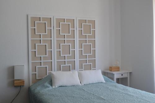 Ένα ή περισσότερα κρεβάτια σε δωμάτιο στο Casa70