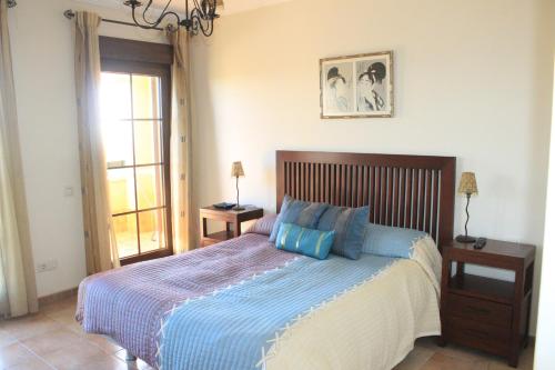 Postel nebo postele na pokoji v ubytování Apartamento primera linea Isla Canela