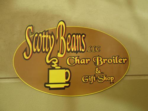 a sign for a coffee shop with a cup at The Grandview at Las Vegas in Las Vegas
