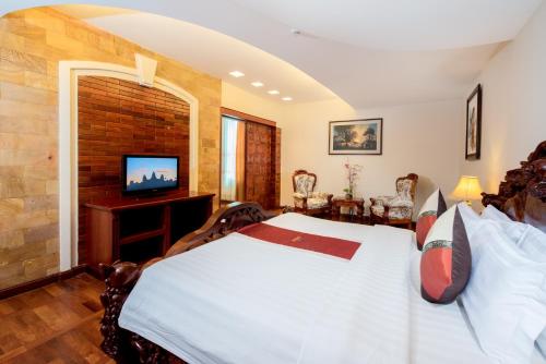 TV a/nebo společenská místnost v ubytování Pacific Hotel & Spa