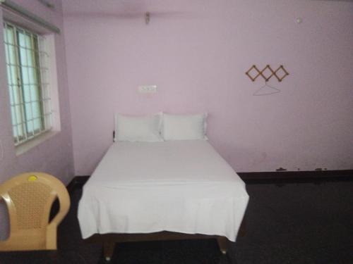 Postel nebo postele na pokoji v ubytování Rainbow Guest House