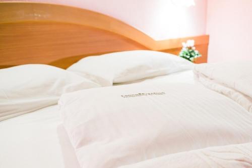 Postel nebo postele na pokoji v ubytování Fondo Brugarolo B&B
