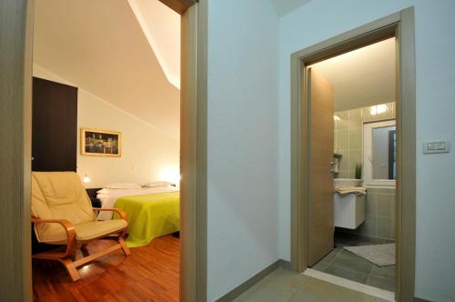 Un baño de Apartments & Rooms Villa Maslina