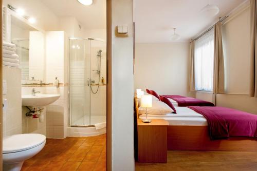 Kúpeľňa v ubytovaní Mały Kraków Aparthotel