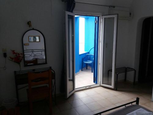 Ένα ή περισσότερα κρεβάτια σε δωμάτιο στο Βίλα Φηροστεφάνι