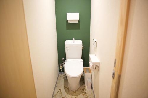 Ένα μπάνιο στο Konyamachi Guest House Kuku