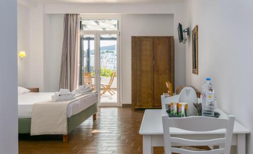 Postel nebo postele na pokoji v ubytování Malion Rooms