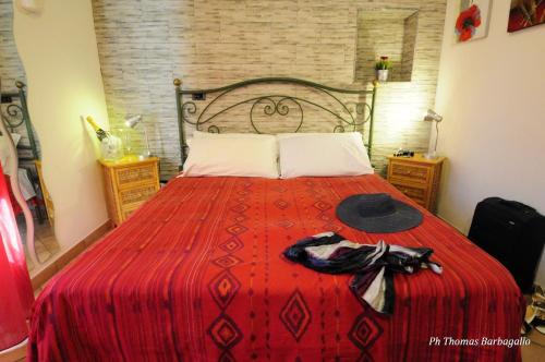 A bed or beds in a room at B&B Giuseppe Verdi