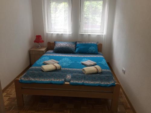 Katil atau katil-katil dalam bilik di Apartman Ljutovac