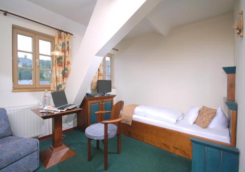 Postel nebo postele na pokoji v ubytování Hotel Saigerhütte