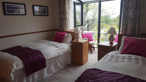 Ένα ή περισσότερα κρεβάτια σε δωμάτιο στο Armada Lodge Seashore Holiday Apartment