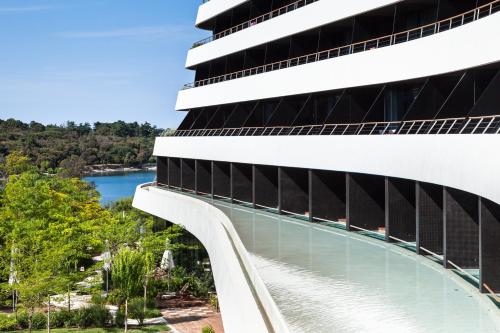 a building with a bridge over a river at Lone Hotel by Maistra Collection in Rovinj