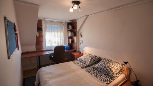 Posteľ alebo postele v izbe v ubytovaní Family Apartment - w cenie 4 rowery, plaża, łódka wiosłowa, kajak, rower wodny