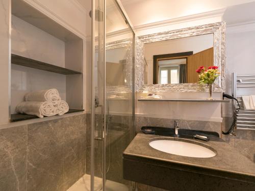 A bathroom at DK Suites