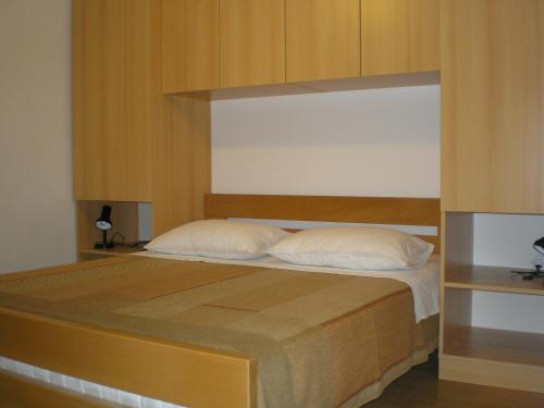 מיטה או מיטות בחדר ב-Apartmani Danica