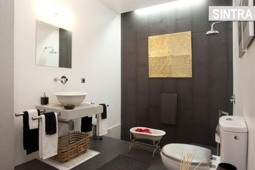 a bathroom with a sink and a toilet at Heaven in the Sintra Forest - with pool in Sintra