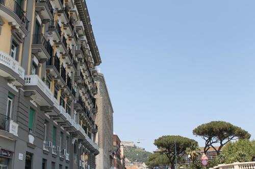 a building with balconies on the side of a street at Bed No Breakfast AK 2 in Naples