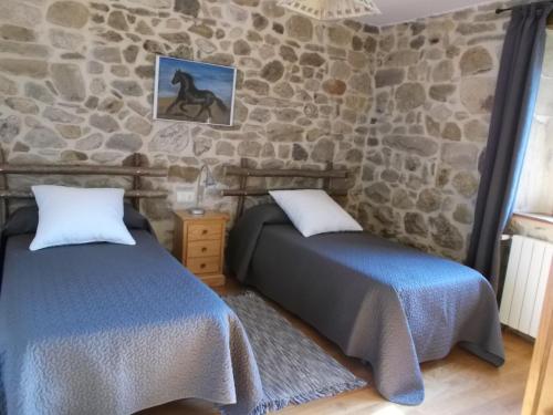 Postel nebo postele na pokoji v ubytování La Escuelona