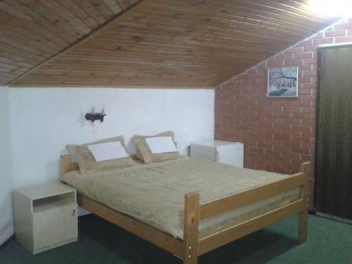 Łóżko lub łóżka w pokoju w obiekcie Mountain house Campari