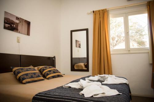 Katil atau katil-katil dalam bilik di Luna Serrana Hotel