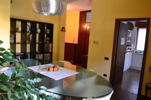 a table in a kitchen with a plate of food on it at B&B Orio BGY in Orio al Serio