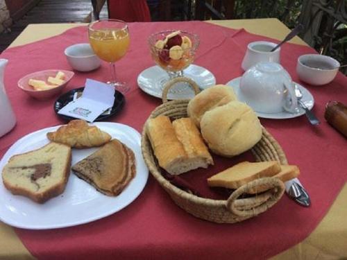 a table with a plate of bread and toast at Belvedere Hotel in Antananarivo
