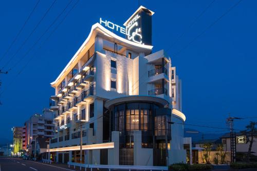 a hotel building with a sign on top of it at HOTEL C. KOKURA-BAY (Love Hotel) in Kitakyushu
