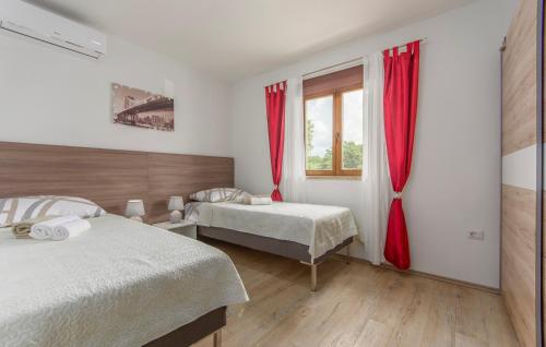 Postel nebo postele na pokoji v ubytování Villa Gita