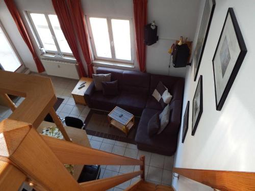 an overhead view of a living room with a couch at Fewo Oase 28_GROT in Ostseebad Karlshagen