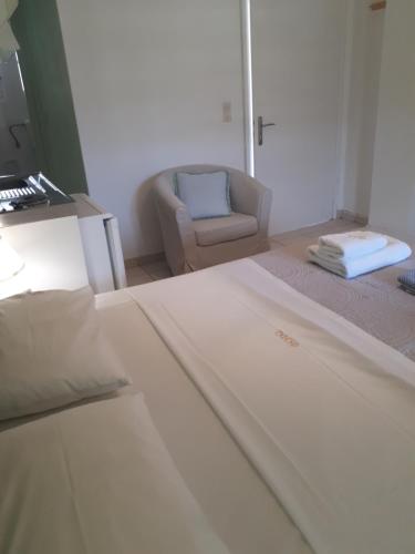 Katil atau katil-katil dalam bilik di Fofos Rooms