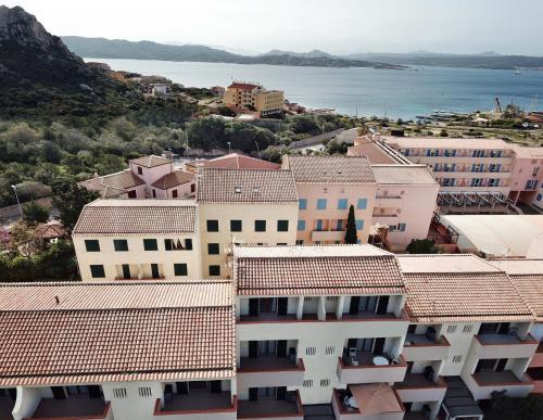 an aerial view of a city with buildings and the water at Blu Baita in La Maddalena