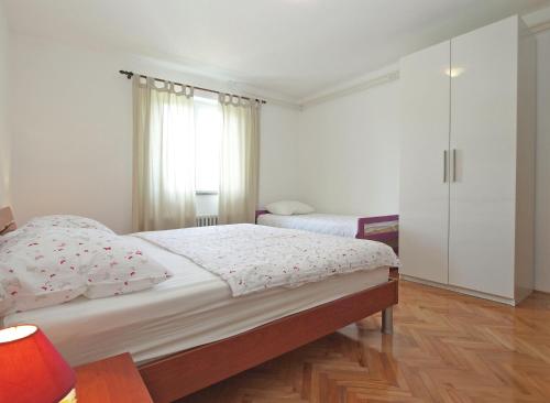 Postel nebo postele na pokoji v ubytování Apartment Vera 1623