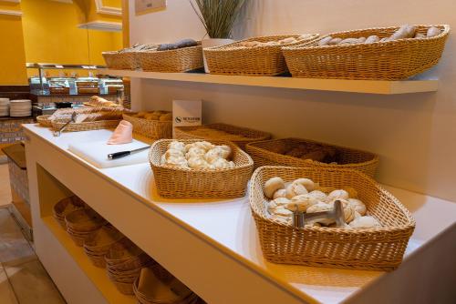 a store with baskets of mushrooms on a shelf at Senator Marbella in Marbella