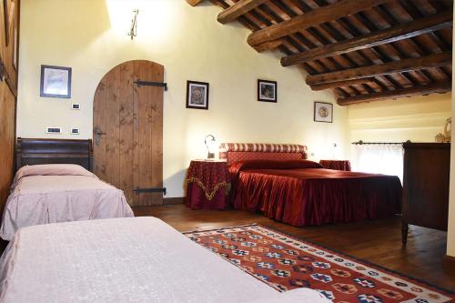 Posteľ alebo postele v izbe v ubytovaní Agriturismo Tenuta Goro Veneto