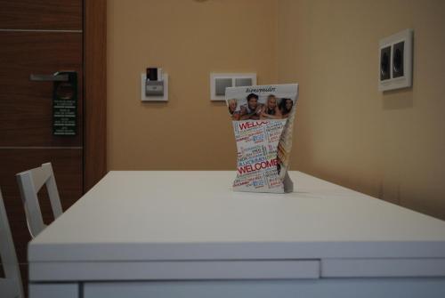 a magazine sitting on top of a table at Casa Chelo Alojamientos Turisticos in Mazaricos