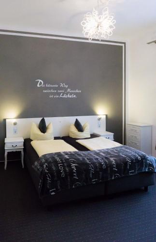Кровать или кровати в номере Hotel Skada City Cölln
