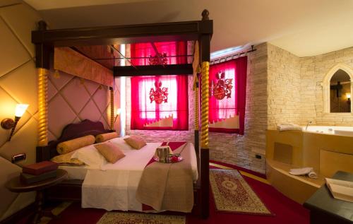 Postel nebo postele na pokoji v ubytování Hotel il Castelletto