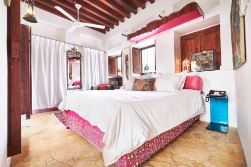 a bedroom with a large bed in a room at XVA Art Hotel in Dubai