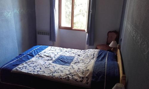 Кровать или кровати в номере Gite Mas Des Ecureuils