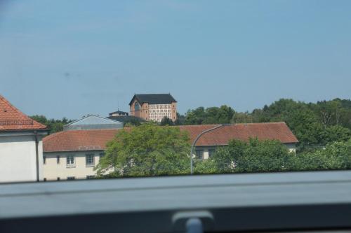 a view of a city with buildings and trees at Gasthof Gruner Baum in Bayreuth