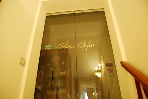 a glass door with the words almaemia written on it at Alloggi Santa Sofia in Venice
