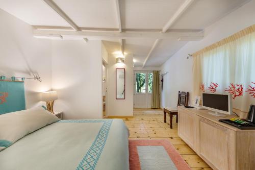 เตียงในห้องที่ Casa Saltara