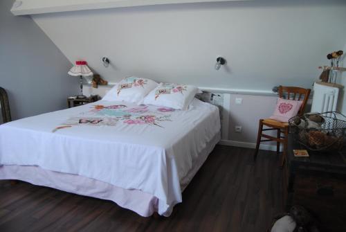 Ένα ή περισσότερα κρεβάτια σε δωμάτιο στο Chambre d'hotes Murielle