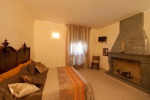 Posteľ alebo postele v izbe v ubytovaní B&B Al Calcandola