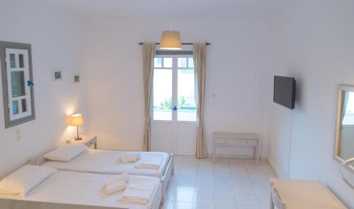 Ostria Hotel & Apartmentsにあるベッド