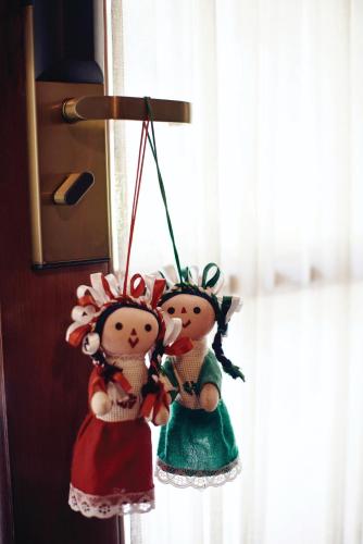 two stuffed animals hanging on a wall at Casa de Sierra Nevada, A Belmond Hotel, San Miguel de Allende in San Miguel de Allende