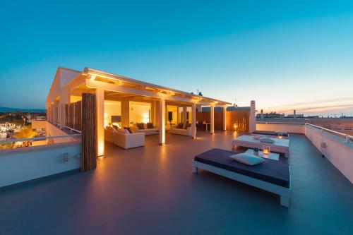 a balcony of a house with a view of the city at Casa del Faro in Torre Canne