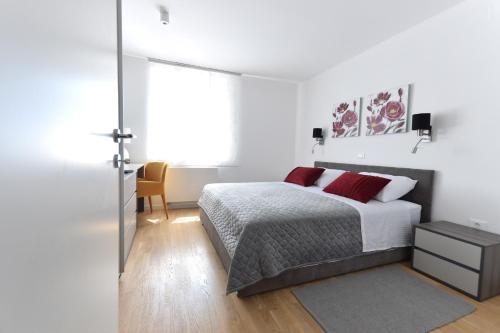 Кровать или кровати в номере Apartment Vostan